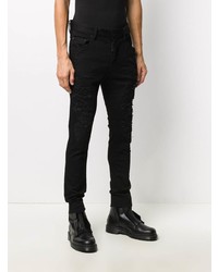 schwarze enge Jeans mit Destroyed-Effekten von DSQUARED2