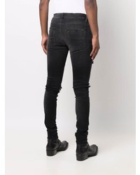 schwarze enge Jeans mit Destroyed-Effekten von Amiri