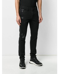 schwarze enge Jeans mit Destroyed-Effekten von Philipp Plein