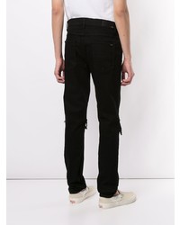 schwarze enge Jeans mit Destroyed-Effekten von Amiri