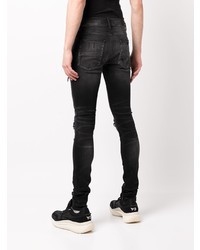 schwarze enge Jeans mit Destroyed-Effekten von Amiri