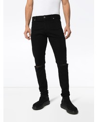 schwarze enge Jeans mit Destroyed-Effekten von Balmain