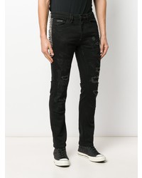 schwarze enge Jeans mit Destroyed-Effekten von Philipp Plein