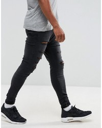 schwarze enge Jeans mit Destroyed-Effekten von Siksilk