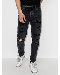 schwarze enge Jeans mit Destroyed-Effekten von Ksubi