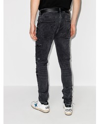 schwarze enge Jeans mit Destroyed-Effekten von Ksubi