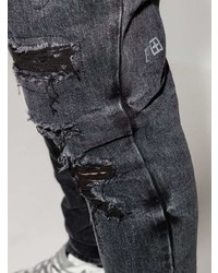 schwarze enge Jeans mit Destroyed-Effekten von Ksubi