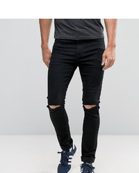 schwarze enge Jeans mit Destroyed-Effekten