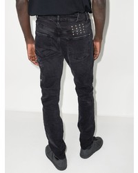 schwarze enge Jeans mit Destroyed-Effekten von Ksubi