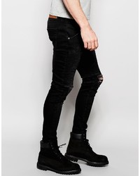 schwarze enge Jeans mit Destroyed-Effekten von Siksilk