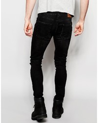 schwarze enge Jeans mit Destroyed-Effekten von Siksilk