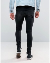 schwarze enge Jeans mit Destroyed-Effekten von Asos