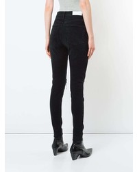 schwarze enge Jeans mit Destroyed-Effekten von RE/DONE