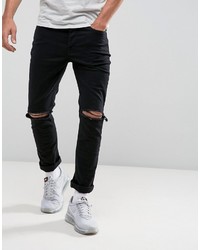 schwarze enge Jeans mit Destroyed-Effekten von Hype