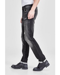 schwarze enge Jeans mit Destroyed-Effekten von Jack & Jones