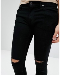 schwarze enge Jeans mit Destroyed-Effekten von Jack and Jones