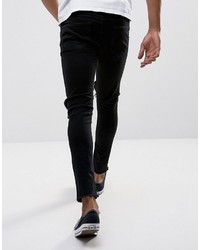 schwarze enge Jeans mit Destroyed-Effekten von ONLY & SONS