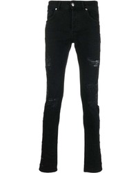 schwarze enge Jeans mit Destroyed-Effekten von John Richmond