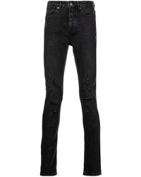 schwarze enge Jeans mit Destroyed-Effekten von Ksubi