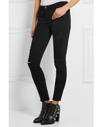 schwarze enge Jeans mit Destroyed-Effekten von Frame