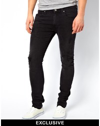 schwarze enge Jeans mit Destroyed-Effekten von Lee