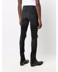 schwarze enge Jeans mit Destroyed-Effekten von Amiri