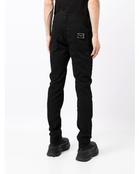 schwarze enge Jeans mit Destroyed-Effekten von Dolce & Gabbana