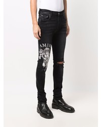 schwarze enge Jeans mit Destroyed-Effekten von Amiri