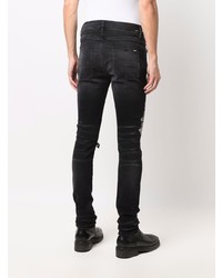 schwarze enge Jeans mit Destroyed-Effekten von Amiri