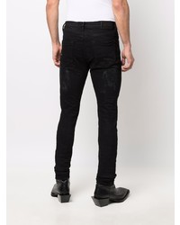 schwarze enge Jeans mit Destroyed-Effekten von Château Lafleur-Gazin