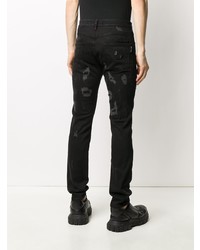 schwarze enge Jeans mit Destroyed-Effekten von Philipp Plein