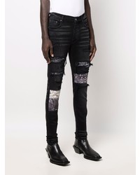 schwarze enge Jeans mit Destroyed-Effekten von Amiri