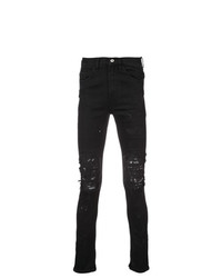 schwarze enge Jeans mit Destroyed-Effekten von Mjb