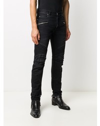 schwarze enge Jeans mit Destroyed-Effekten von Balmain