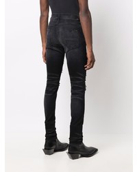 schwarze enge Jeans mit Destroyed-Effekten von Amiri