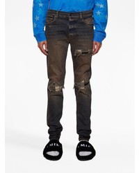 schwarze enge Jeans mit Destroyed-Effekten von Amiri