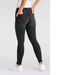 schwarze enge Jeans mit Destroyed-Effekten von Only