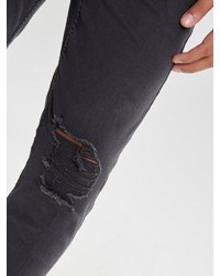 schwarze enge Jeans mit Destroyed-Effekten von ONLY & SONS