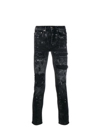schwarze enge Jeans mit Destroyed-Effekten von Overcome