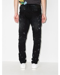 schwarze enge Jeans mit Destroyed-Effekten von purple brand