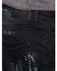 schwarze enge Jeans mit Destroyed-Effekten von purple brand