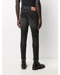schwarze enge Jeans mit Destroyed-Effekten von PRPS