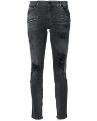 schwarze enge Jeans mit Destroyed-Effekten von PIERRE BALMAIN