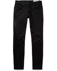 schwarze enge Jeans mit Destroyed-Effekten von rag & bone