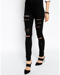 schwarze enge Jeans mit Destroyed-Effekten von Asos