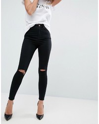 schwarze enge Jeans mit Destroyed-Effekten von Asos