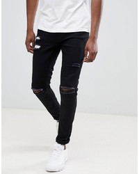 schwarze enge Jeans mit Destroyed-Effekten von Ringspun