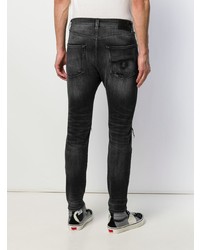 schwarze enge Jeans mit Destroyed-Effekten von R13