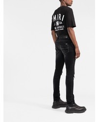 schwarze enge Jeans mit Destroyed-Effekten von Amiri