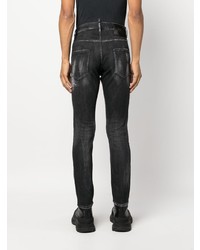 schwarze enge Jeans mit Destroyed-Effekten von DSQUARED2